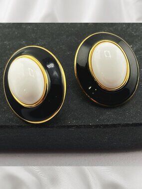 MONET Vintage black white enamel and gold tone metal domed oval clip-on earrings